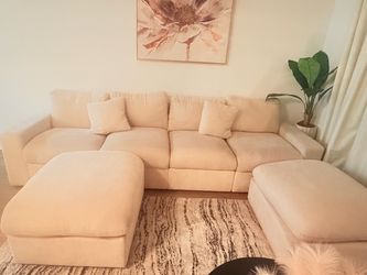Cream Sectional Sofa with Two Ottomans