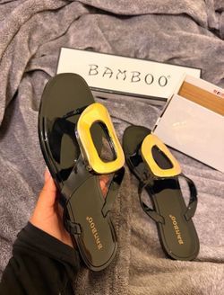 Size 6 black and gold sandals