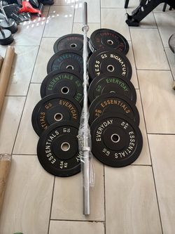 Olympic bumper weights 300lbs total plus brand new 7ft 45lbs bar firm price