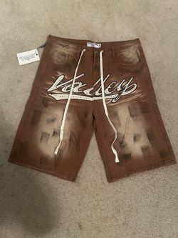 Brown & white Valley shorts with white 'Valley' script logo, size 36
