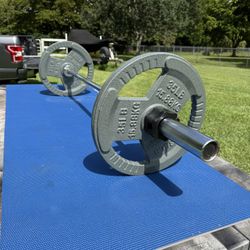 Set Including 5’ Olympic Bar And Pair Of 35 Pound Easy Grip Weights 