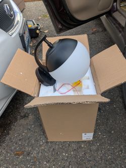 New in boxes 4 black with white globe's lights