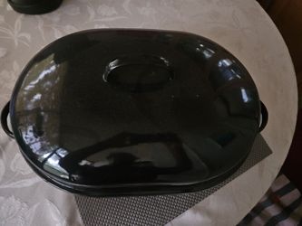 classic oval roasting granite ware or speckled enamelware
