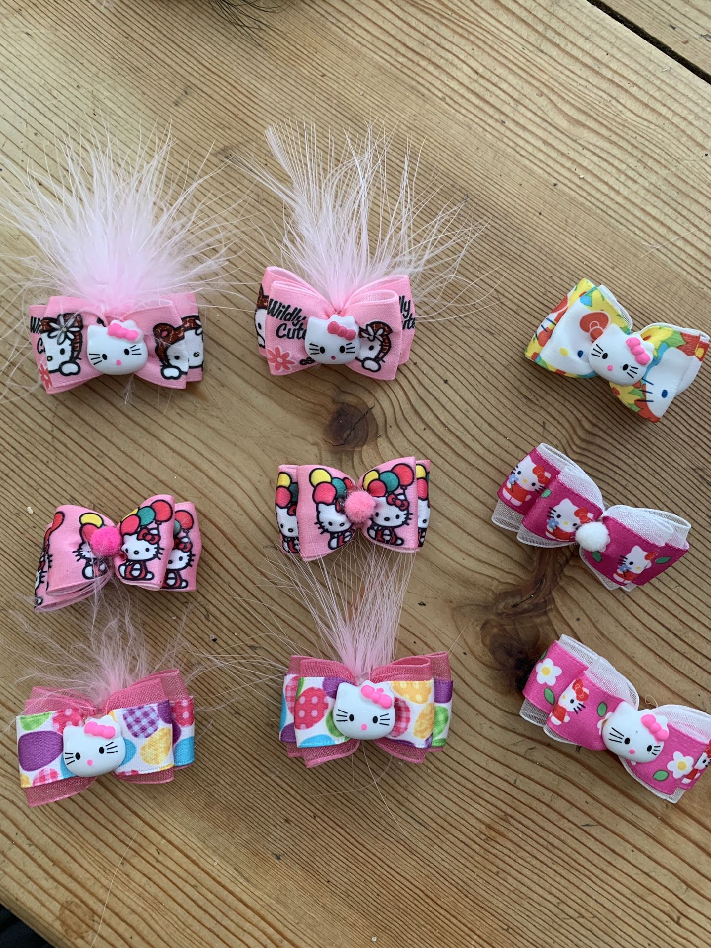 Lot of 9 hello kitty hair bows/clips