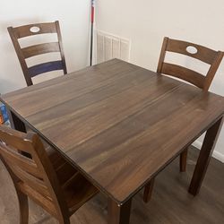 Dinette Table And Four (4) Chairs 