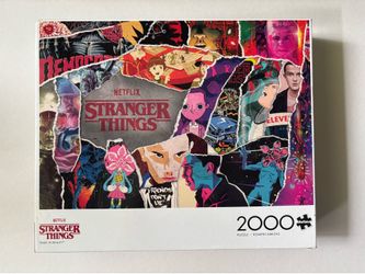 Buffalo Games 2000-piece jigsaw puzzle titled "Stranger Things - Tears in Reality