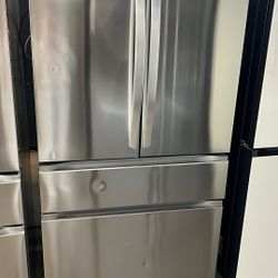 NEW OPEN BOX LG FOUR DOOR REFRIGERATOR STAINLESS STEEL 