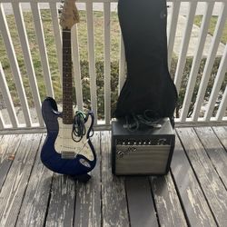 Fender Squier Stratocaster Guitar + Fender Frontman Amp + Case & Cables