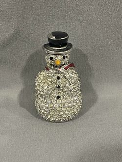 Vintage Estée Lauder perfume snowman