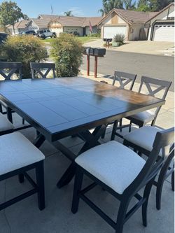 9 - Piece Counter Height Dining Set