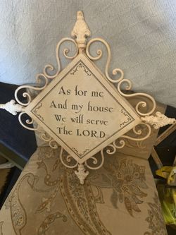 This vintage-style diamond wall plaque features the well-known Christian declaration, "As for me and my house we will serve the Lord." Made out of iro