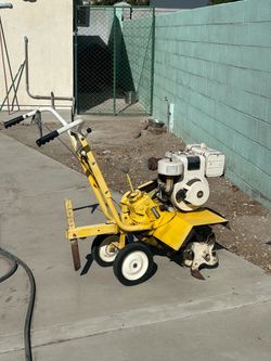 Yellow Gas-Powered Rear-Tine Tiller