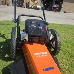 24 in. 163 cc
Briggs and
Stratton Gas 4-
Stroke Walk
Behind Push
Wheeled String
Trimmer Field
Mower w/155
Diameter Line