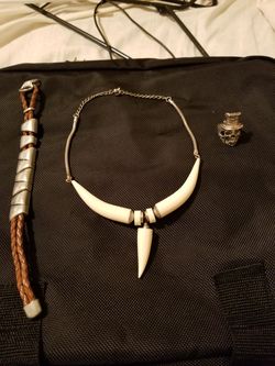 Men's bracelet, women's necklace, top hat skull ring.