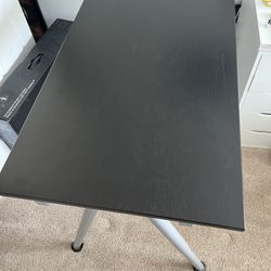 Student desk, 24"x48", adjustable height, like new!