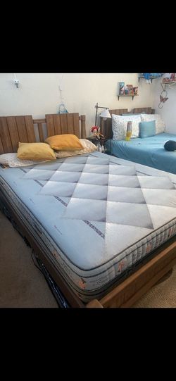 Twin full  bed   Frame  is wood very good wood