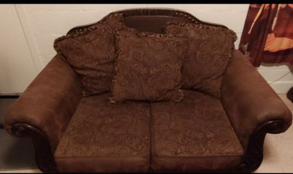 Brown Paisley Loveseat with Wood Trim
