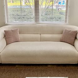 Modern Design 2 Cream Color Sofas  For sale: 2 identical modern design sofas. 	•	Color: Cream (soft textured upholstery) 	•	Size: 3-seater wide seatin