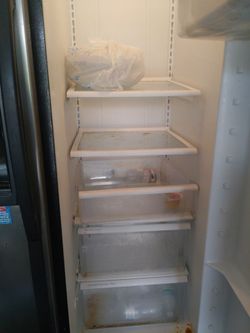 Refrigerator freezer and a barbecue pit