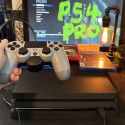 PS4 Pro , 3 games included , controller , HDMI , 2 power cables , Charge / docking station , it's a like new PS5 alternative
