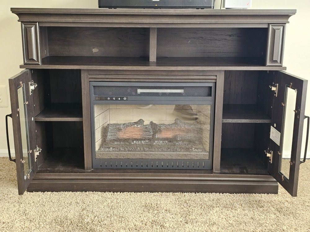 Electric Fireplace/ TV Stand.. Offers Considered