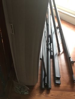Bunk grey metal twin bed with the mattress