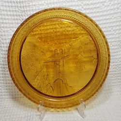 Indiana glass amber round glass platter with home in the country theme. 