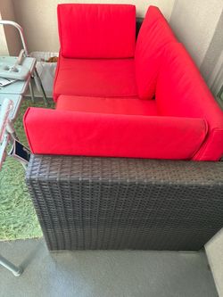 Two piece Rattan wicker loveseat with red seats included classy outdoor patio furniture