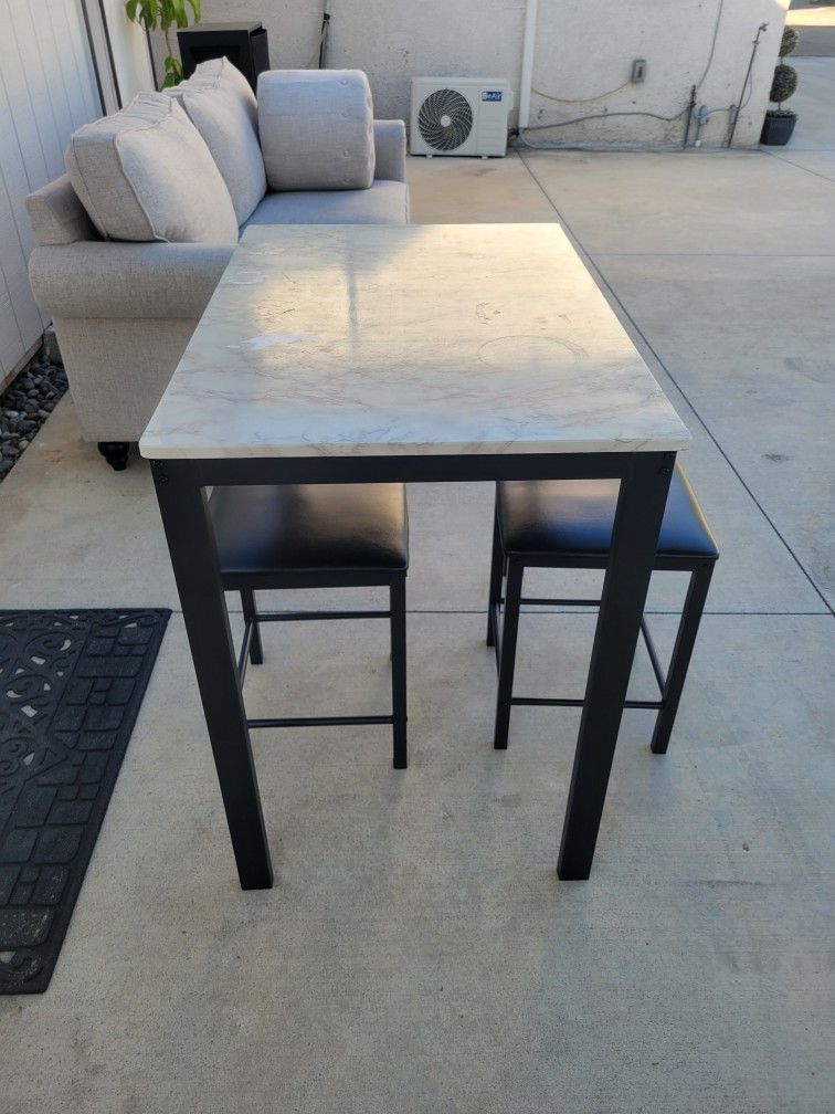 3 Piece Table And Stools