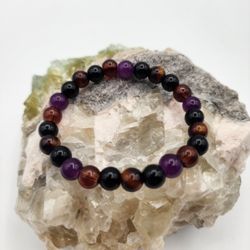 Obsidian, Smoky Quartz, Tiger Eye & Amethyst Stretch Bracelet – Grounding Balance

This stretch bracelet features an alternating bead design using bla