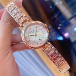 A quartz watch, a suitable accessory for a lady's leisure and entertainment, with a reasonable price.