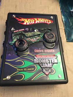 Hot Wheels Mattel 3D Monster Jam Storage Carrying Case Boys can hold and carry up to 15 of their favorite Monster Jam trucks inside this rugged case. 