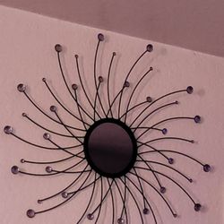 black and mirror hanging art