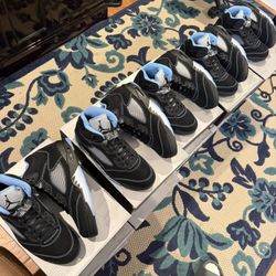 ÀJ UNC 5