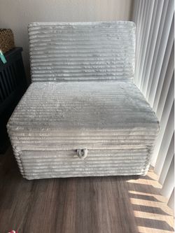 Chair/roll out bed