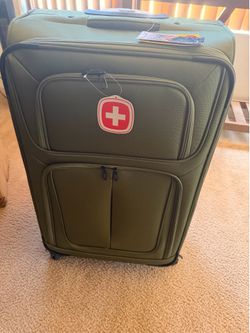 Brand New 29in Swiss Gear spinner luggage