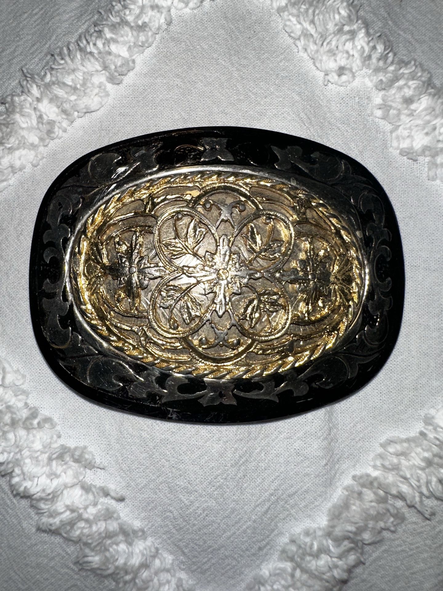 Gold black belt buckle