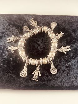 Sterling silver antique clown charm bracelet