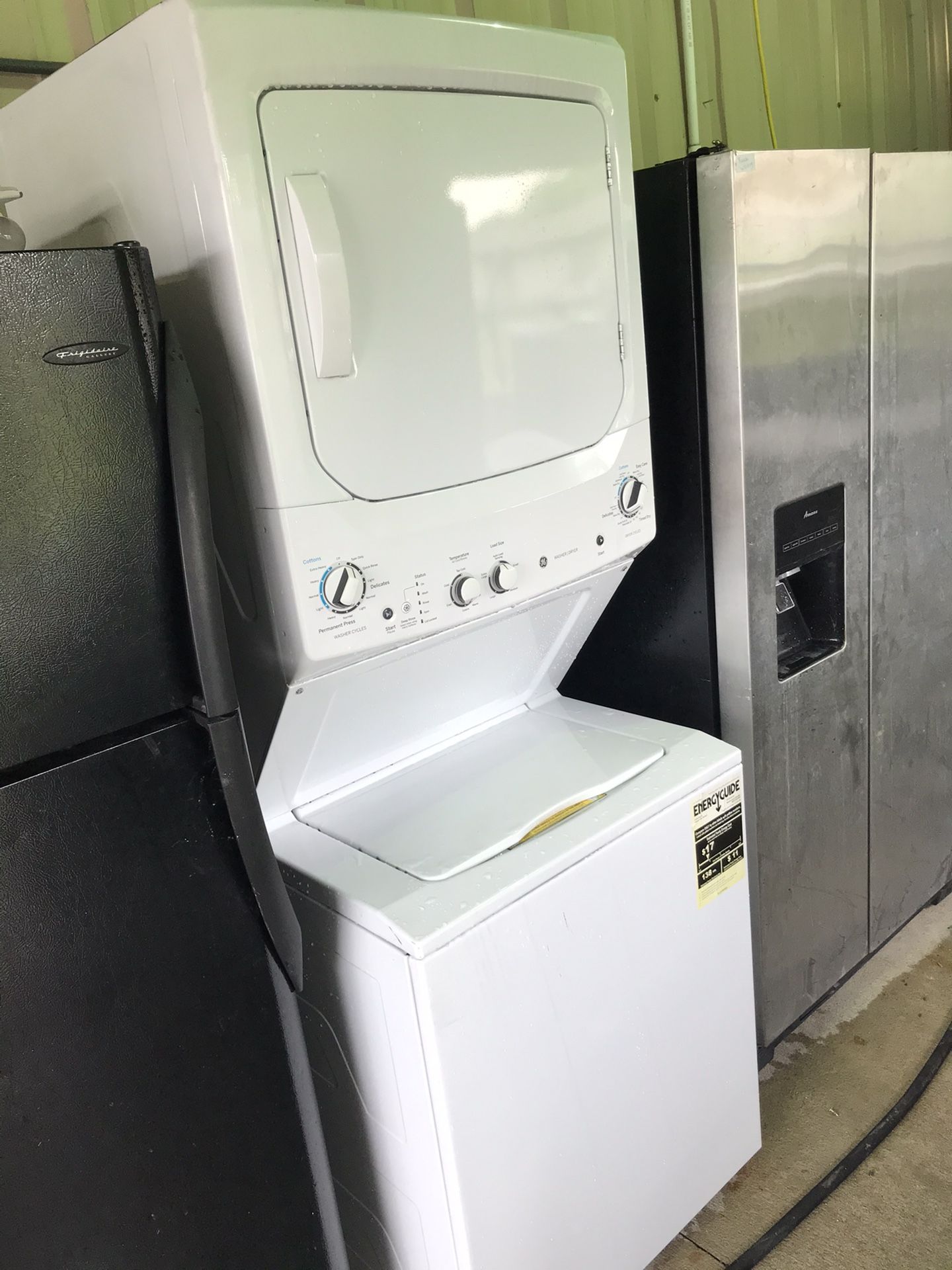 New model 27” stackable Ge washer and electric dryer combo used refurbished with warranty