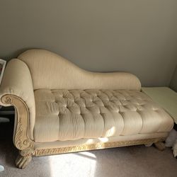Elegant Chaise Lounge With Tufted Seat And Pillows