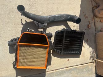 Stock intakes and front air intake tube for n54