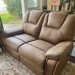 BRAND NEW RECLINING COUCH 