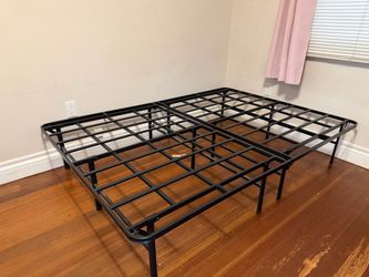 Full size metal bed.