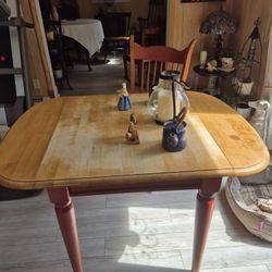 Solid wood, drop leaf kitchen table with two chairs