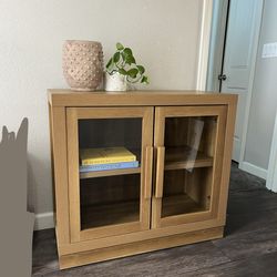 Light wood accent cabinet bookshelf entryway glass doors