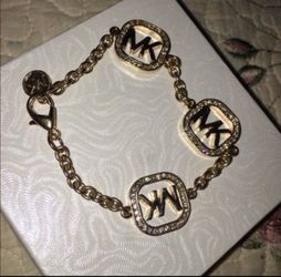 Mk bracelet and earring set bundle price for both!!!