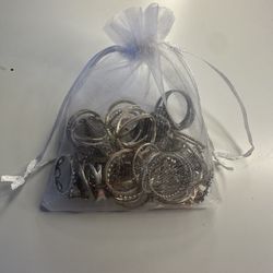 Bag of gold and silver rings 