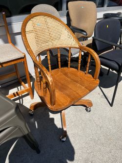 Vintage cane swivel chair (in store)