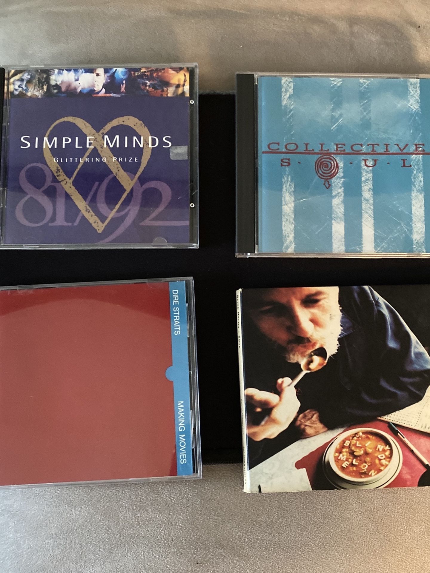 Set Of 4 CD’s Dire straits/Blind Melon/Simple Minds/CollectiveSoul
