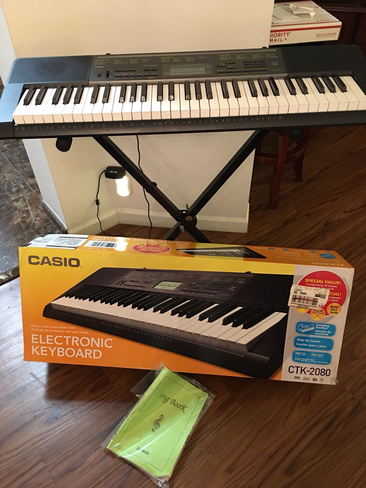 Casio Electronic Keyboard CTK-2080 in Excellent Working & Cosmetic Condition. Original Box, Song Book, Stand and AC charger. $110 OBO.